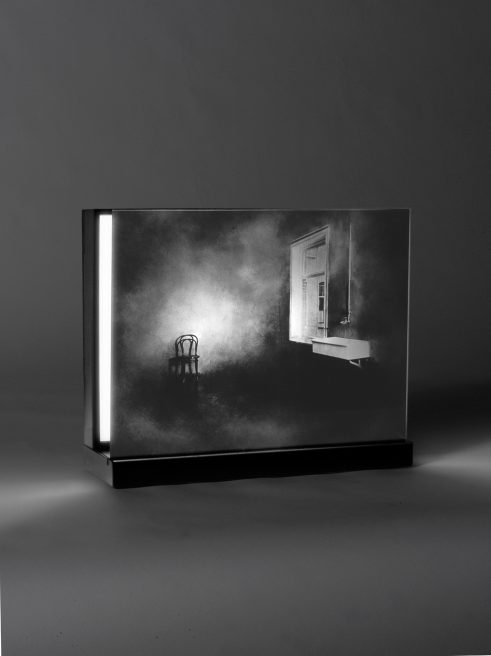 Room with a window (1999-2004). Emulsion on glass, light, lacquered wood. 40 x 50 x 17 cm