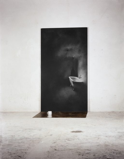Untitled with a white cup. Iron, macrodevelopment of photographic image, hand made paper, pigment. 220 x 125 x 85cm