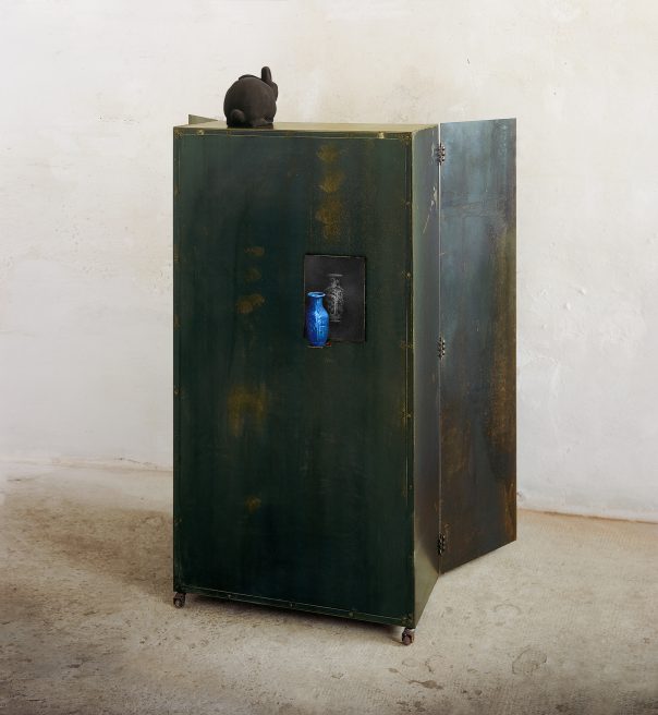 Untitled with a white dress (back-side). Iron, hand-made paper, pigment, glass, photo. 175 x 90 x 40 cm