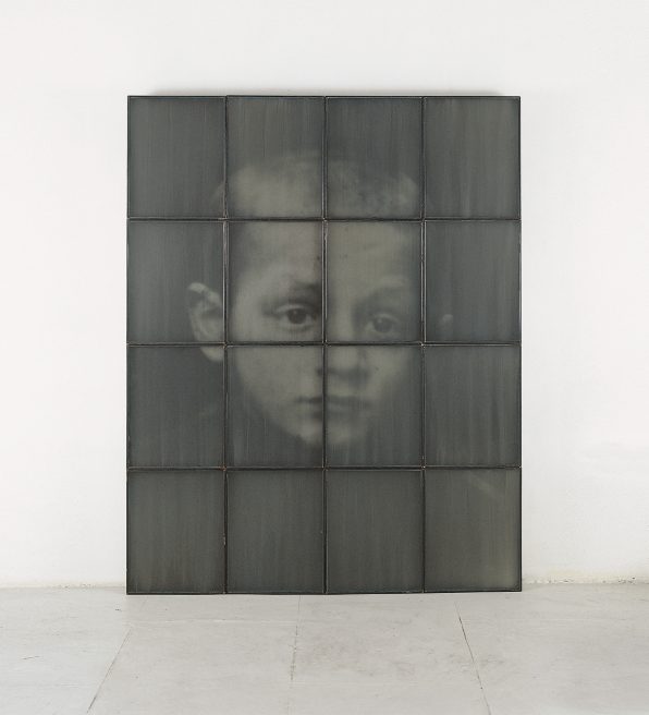 Untitled (boy) (1999-2000). Iron, macrodevelopment of photographic image, glass, pigment. 165 x 134 x 5 cm