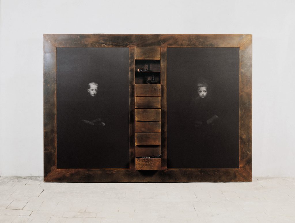 Bambini di Genova (1990). Iron, macrodevelopment of photographic image, hand-made paper, pigment . Collection of Sir Elton John. 161 x 230 x 14 cm