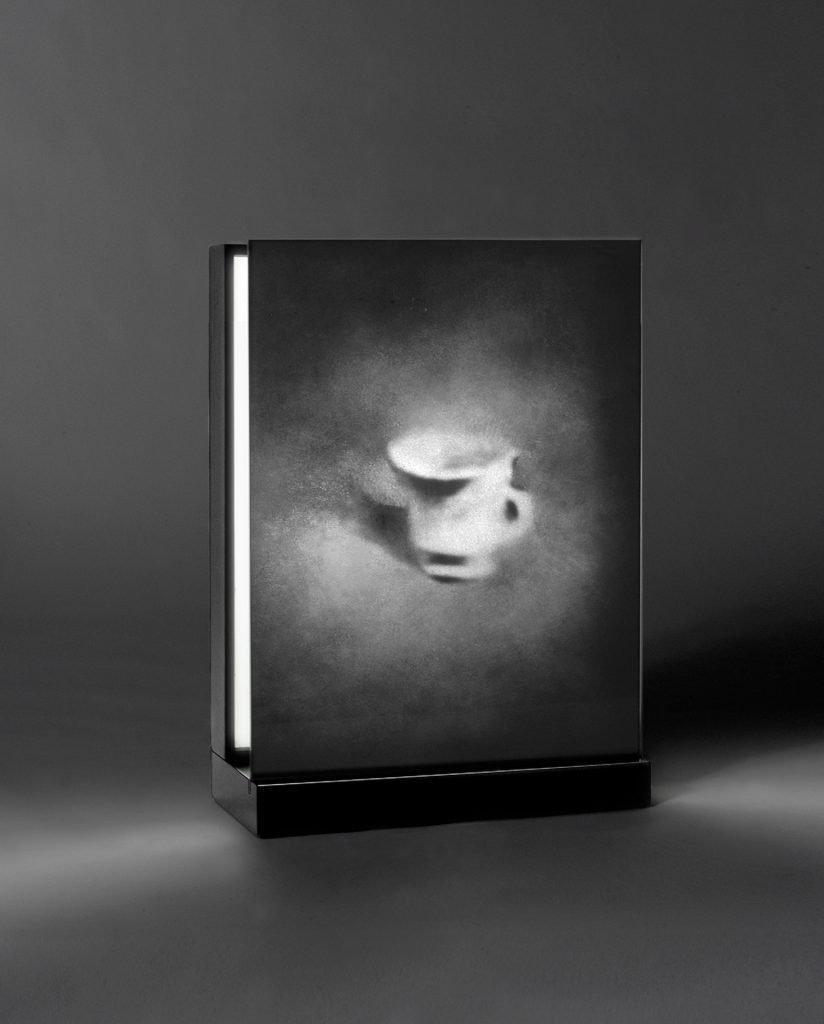 Cup (2000-2005). Emulsion on glass, light, lacquered wood. 53 x 40 x 17 cm