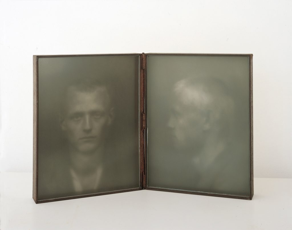 L'altro (2002). Iron, image, glass, pigment. 42 x 62 x 5 cm