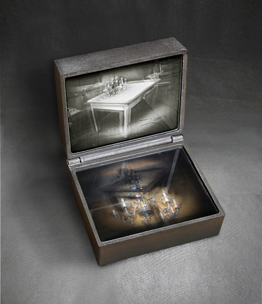 Table. Cast iron, image on glass. 28 x 25 x 22 cm