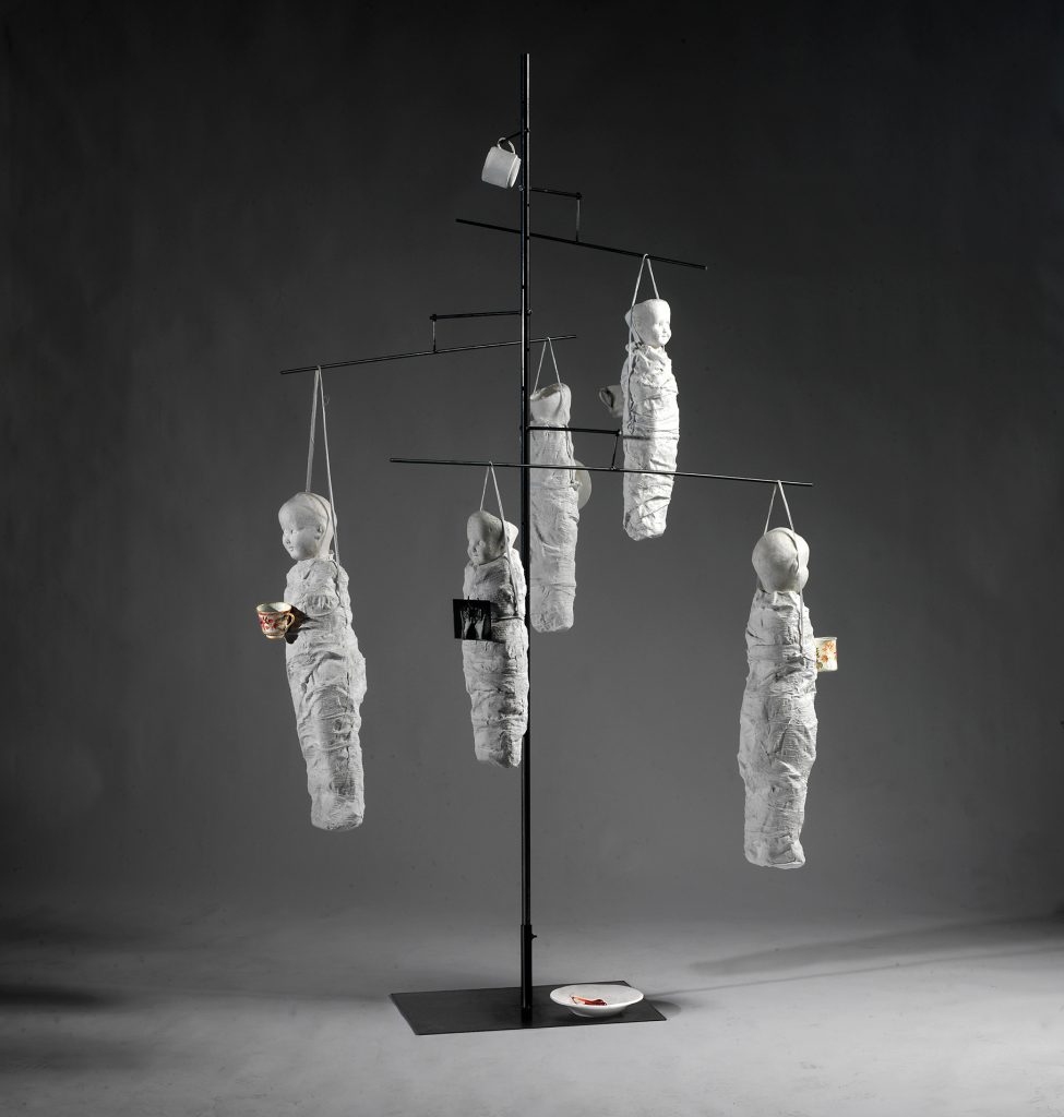 Tree of innocence (2003-2005). Iron, hand-made paper, gauze, pigment, glass. 231 x 125 x 122 cm