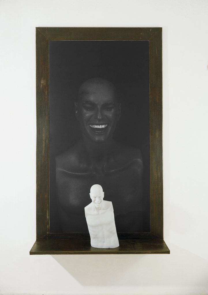 Untitled (The Smile)(1998-1999). Iron, macrodevelopment of photographic image, hand-made paper, pigment. 225 x 140 x 30 cm