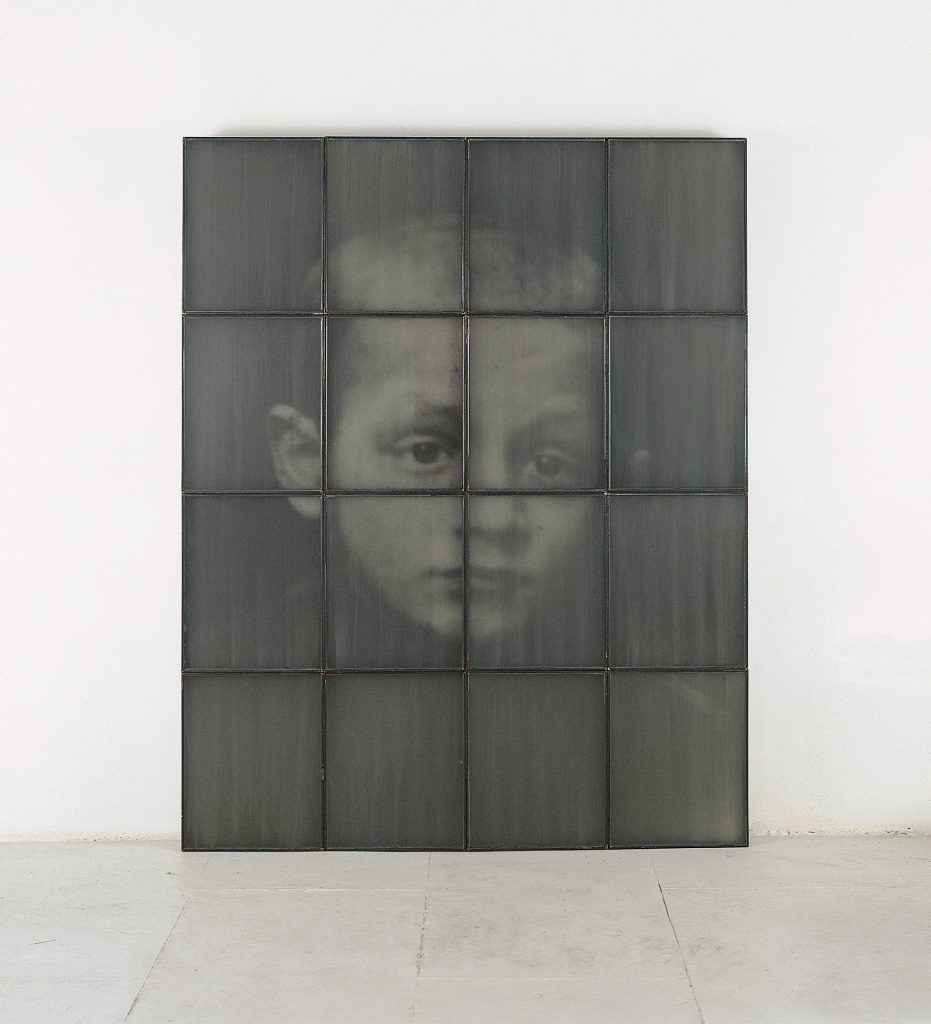 Untitled (boy) (1999-2000). Iron, macrodevelopment of photographic image, glass, pigment. 165 x 134 x 5 cm
